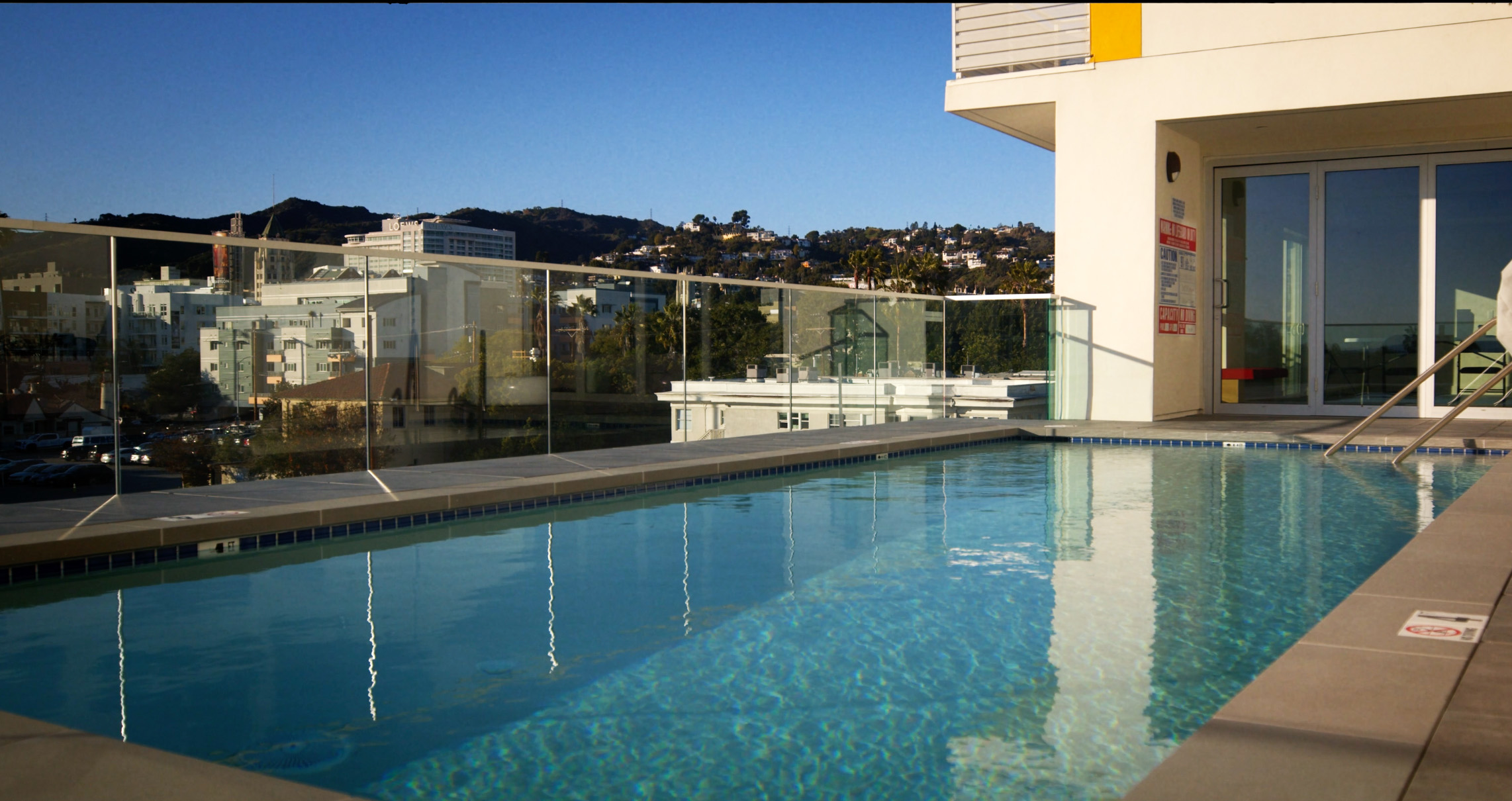 View of Dive into Luxury: The Top 8 Coolest Apartment Pools in the U.S. | Ori ...